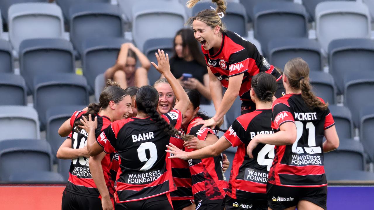 Celebrating Western Sydney Wanderers players.