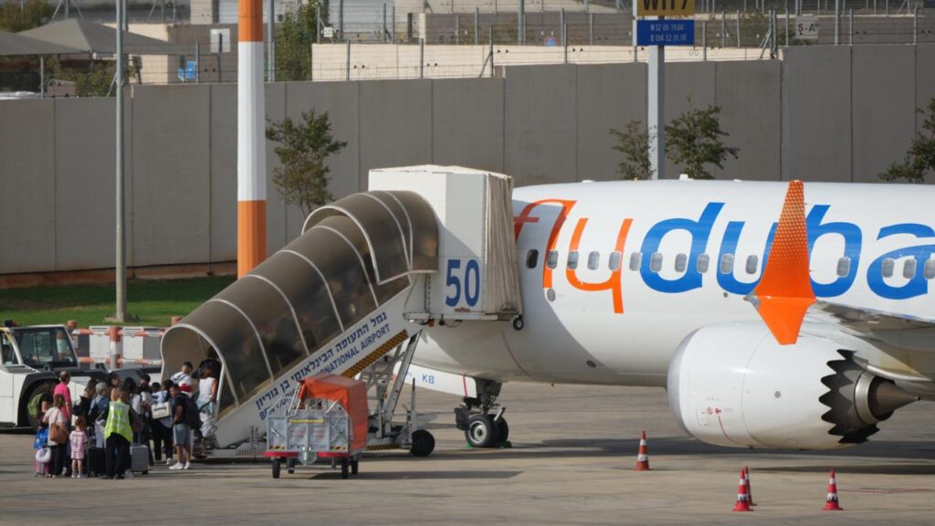 A replacement flight carrying passengers of a plane involved in a stabbing landed in Israel.

