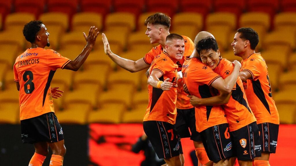 Brisbane Roar players celebrate Nam Tae-hee’s first-half wonder strike.
