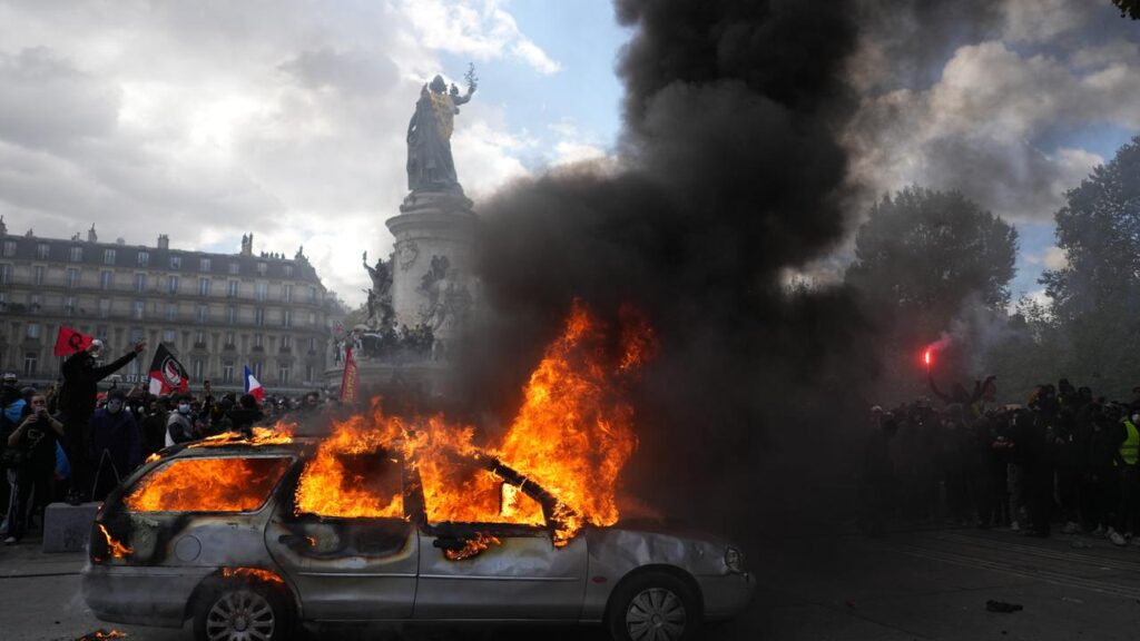 About 2400 people were arrested while nearly 1000 officers were injured in protests across France.
