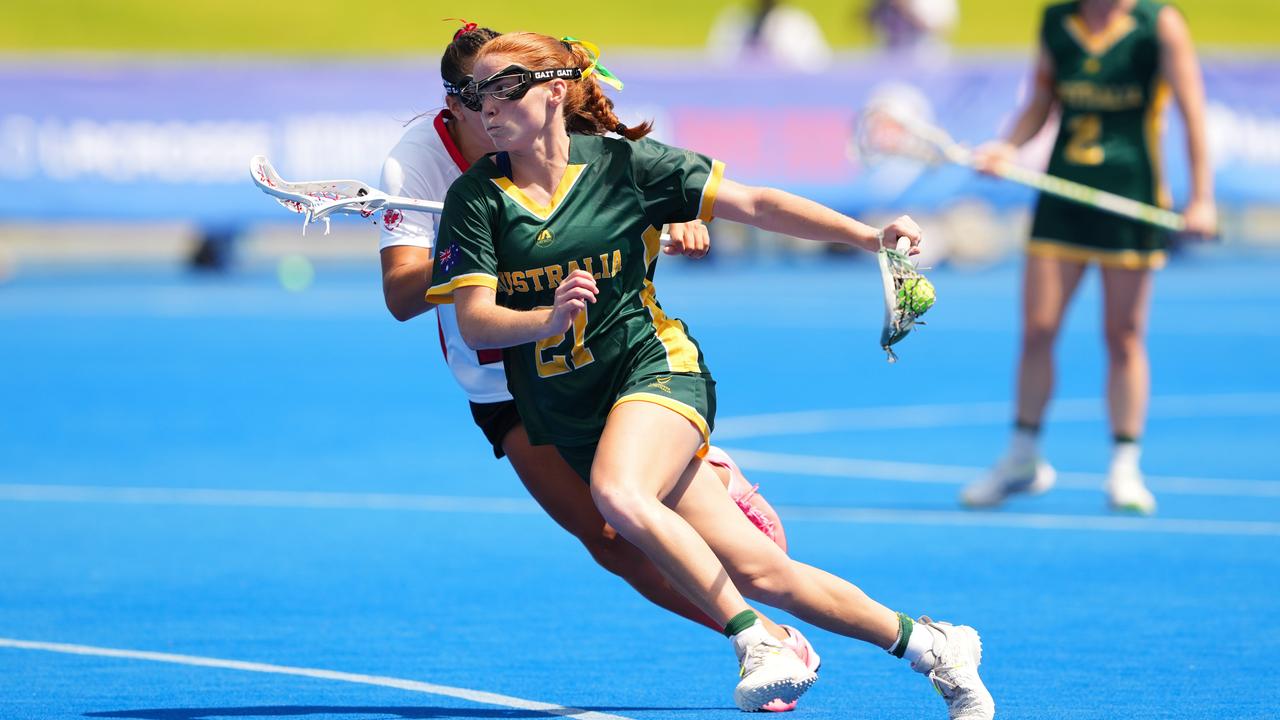 Mim Suares-Jury playing lacrosse