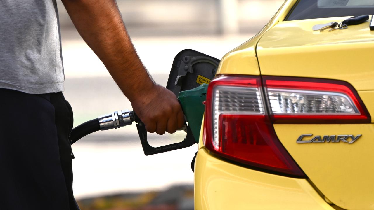 A person fill up their car with fuel (file image)