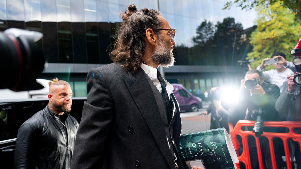 Comedian and actor Russell Brand arrives at the Southwark Crown Court
