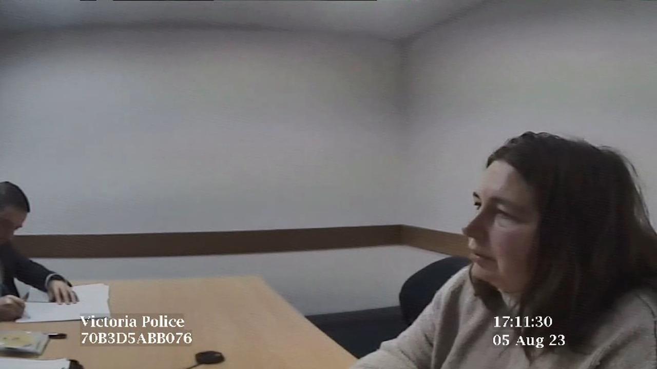 woman in police interview room