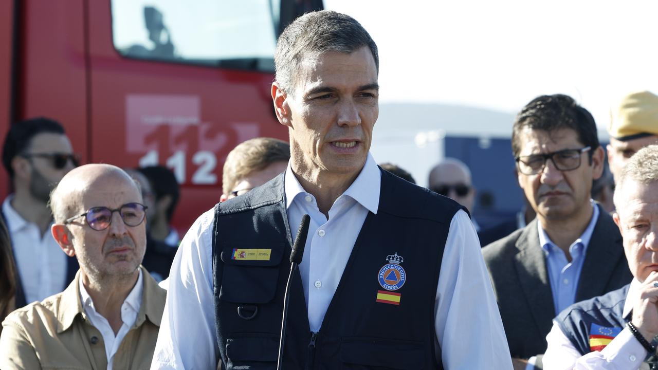 Spanish Prime Minister Pedro Sanchez speaks at the train crash site