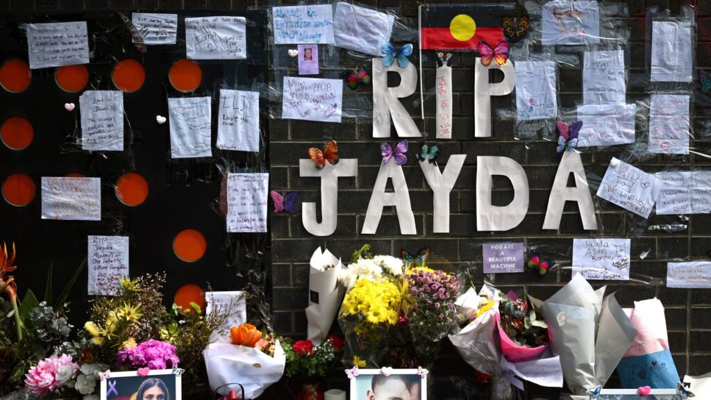 A streetside memorial for Jayda Allen Bonner grows outside a building in Carlton.
