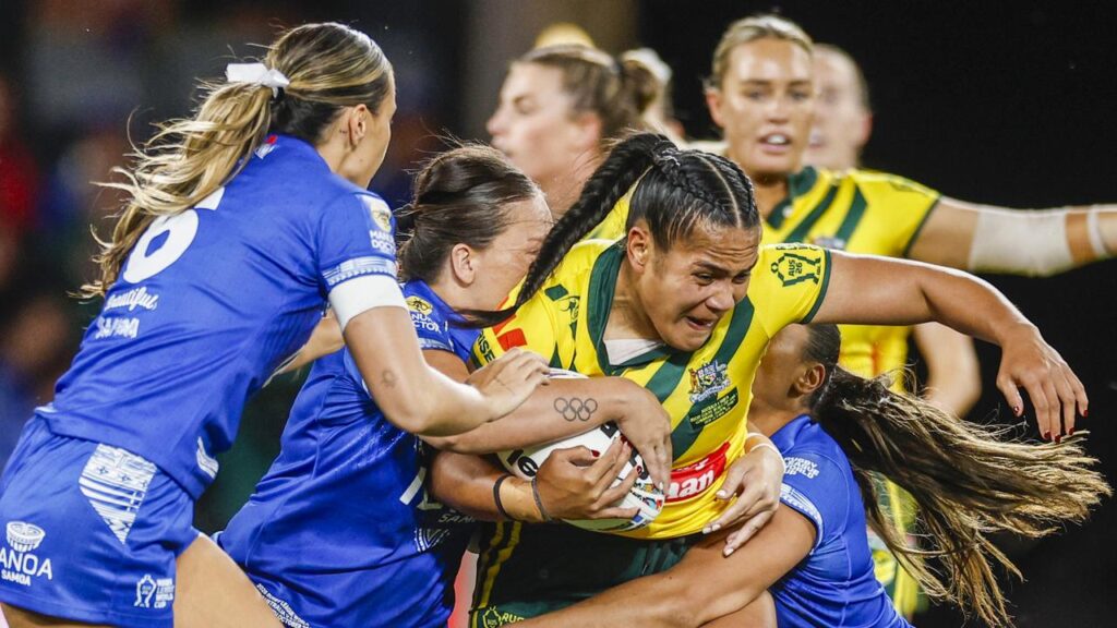 Australia powered their way to a 40-0 opening-round win over Samoa in the World Cup.
