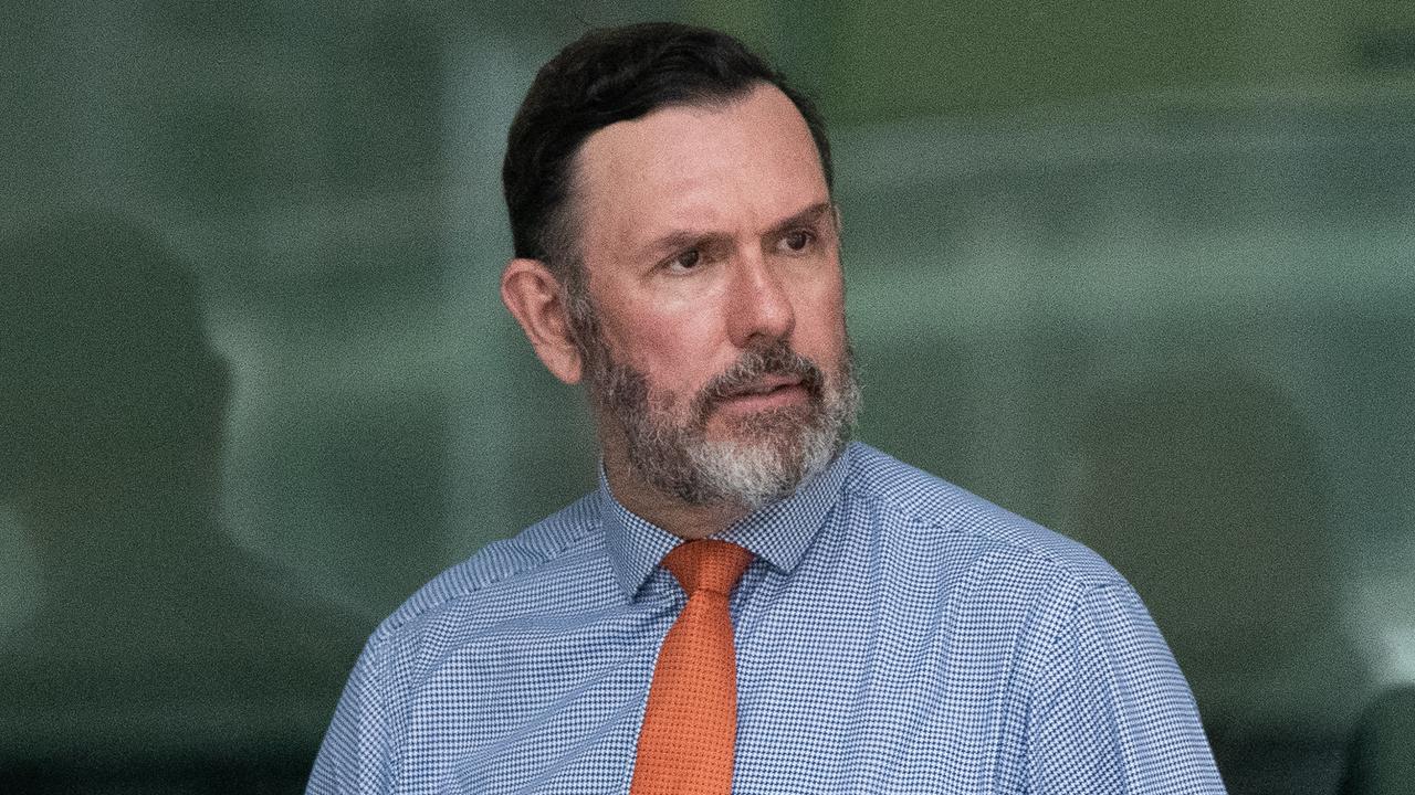 Man in tie and blue shirt