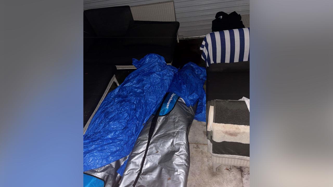 surfboard bags in a courtyard